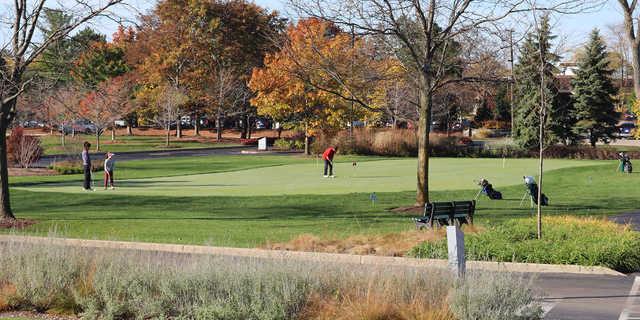 A fall day view of the practice putting green at Deerfield Golf Club.