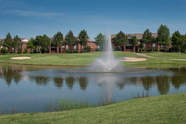 A view of a green with water coming into play at The Links of Madison County Golf & Country Club.