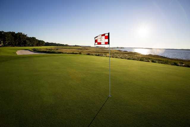 A sunny day view of a hole from Harbour Town Golf Links at Sea Pines Resort.