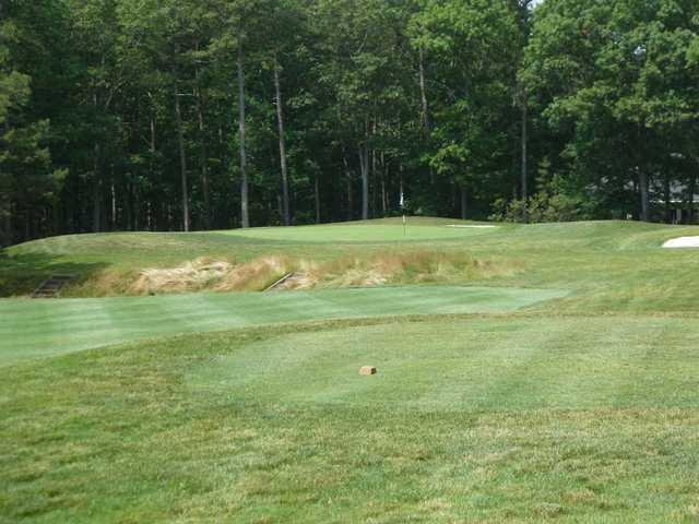 The par-3 sixth hole on the Pines Course at Seaview resort is a tricky carry over a bunker.