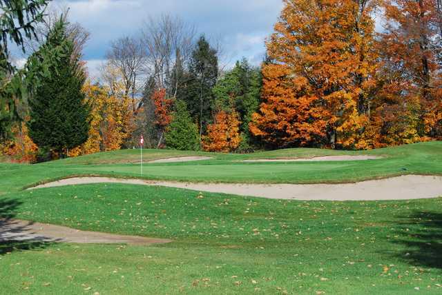A fall day view of a hole at Mill Run Golf Club.