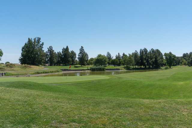 A sunny day view of a hole at Bartley Cavanaugh Golf Course.