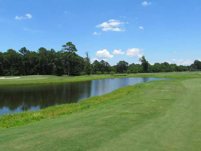 A view over the water of a green at Gateway Park Golf Course.