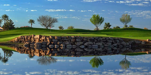 A view over the water of a hole at Encanterra Country Club.