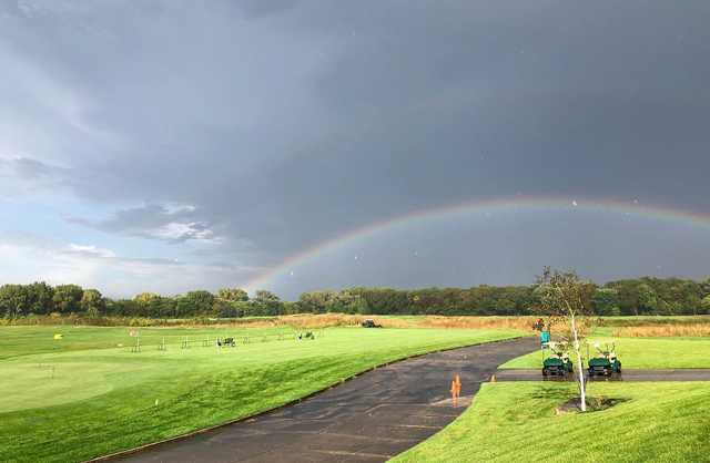 A view of the rainbow over the practice area at Coldwater Golf Links.