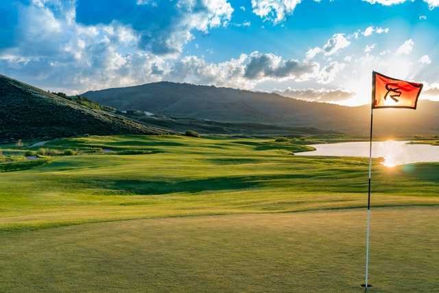 A sunny day view of a hole at Grand Elk Golf Course.