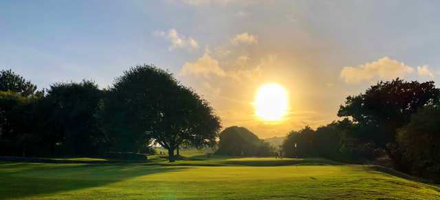 Sunset view of the 14th green at The Point at Polzeath.