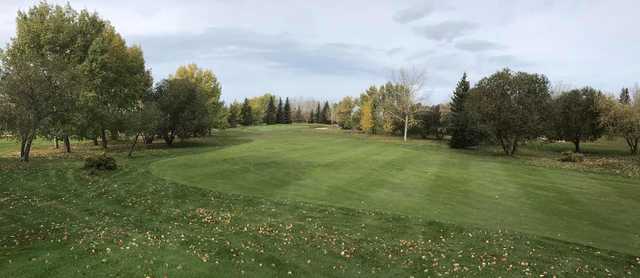 A fall day view of a fairway at Camrose Golf Course.