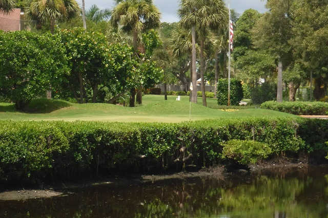 A view over the water of a hole at Jupiter Dunes Golf Course.