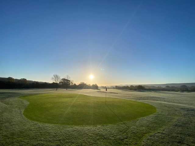 A sunny morning view of a hole at Mid Sussex Golf Club.