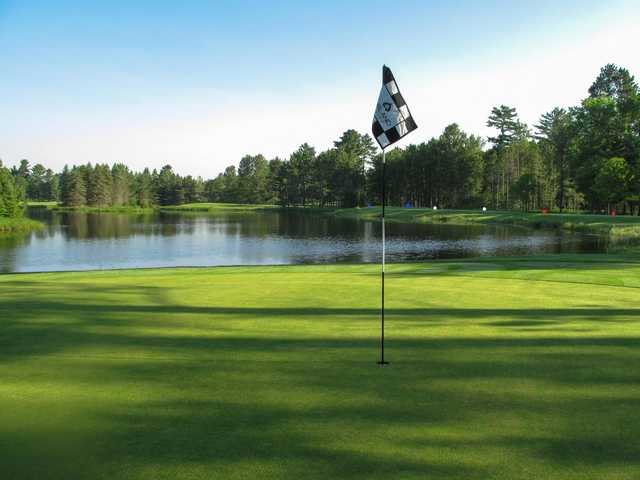 A view from the 6th green looking back at the tee boxes at Reflections Course from Garland Lodge & Golf Resort.