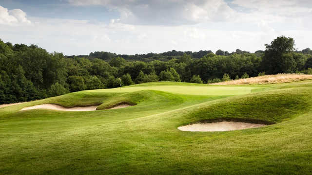 A view of a green surrounded by bunkers at Dale Hill Course from Dale Hill Hotel & Golf Club.