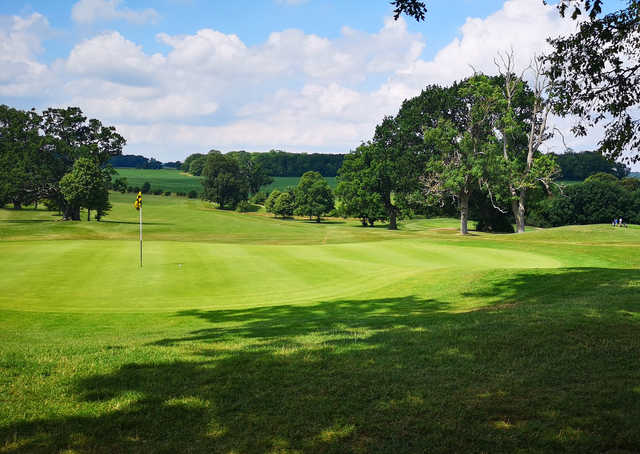 A sunny day view of a hole at Orchardleigh Golf Club.