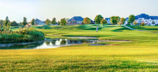 A view of a green with bunkers and water coming into play at Hunters Ridge Golf Course.