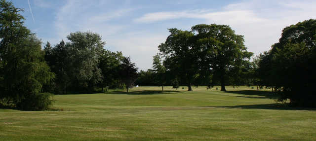 A sunny day view of a hole at Rhuddlan Golf Club.