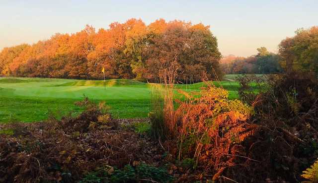 A fall day view of a hole at Newbury & Crookham Golf Club.