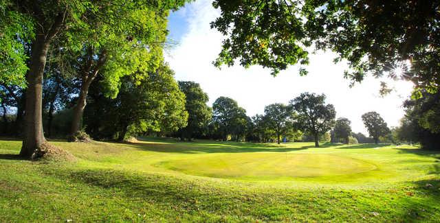 A sunny day view of a green at Blue Course from Wexham Park Golf Centre.