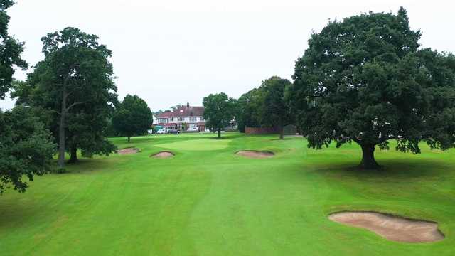 A view of a green and the clubhouse in background at Upton by Chester Golf Club.