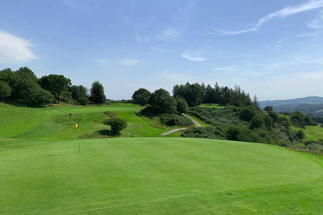 A sunny day view of a hole at Windermere Golf Club.