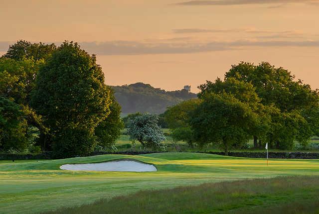 A sunset view of a hole at Moorland Course from Breadsall Priory Golf & Country Club.