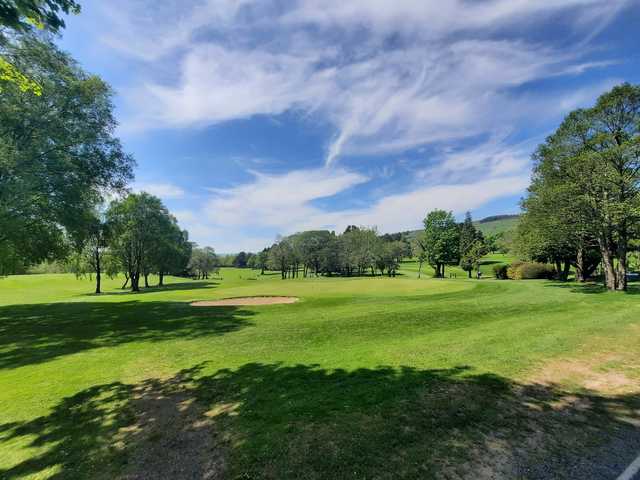A sunny day view of a green at Chapel-en-le-Frith Golf Club.