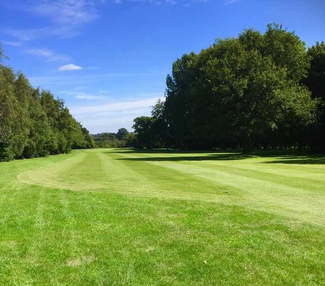 A view of a fairway at The Pastures Golf Club.