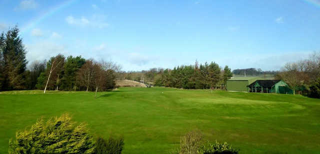 A sunny day view of a green at Barnard Castle Golf Club.
