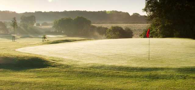 A sunny day view of a green at Blackwell Grange Golf Club.