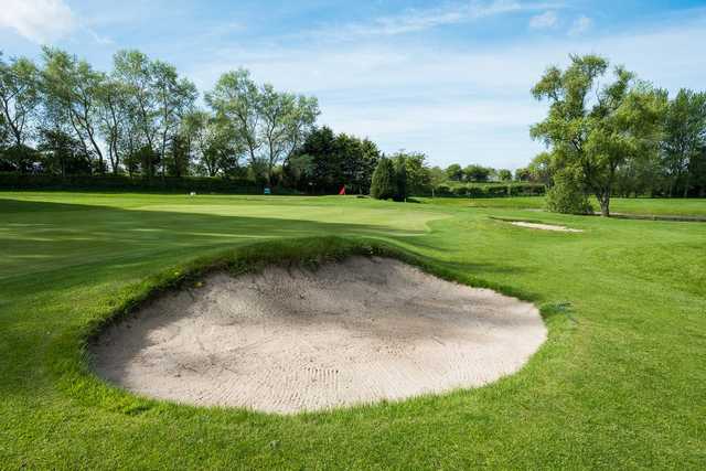 A view of a well protected hole at Hainsworth Park Golf Club.