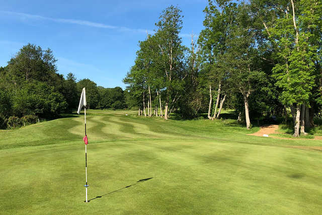 A sunny day view of a hole at 18-hole Course from Sedlescombe Golf Club.