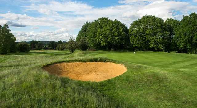 A sunny day view of a hole at Addington Court Golf Centre.
