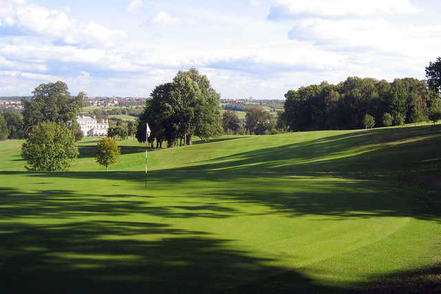 A sunny day view of a hole at Addington Palace Golf Club.