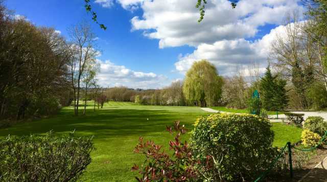 A sunny day view from Mill Hill Golf Club.