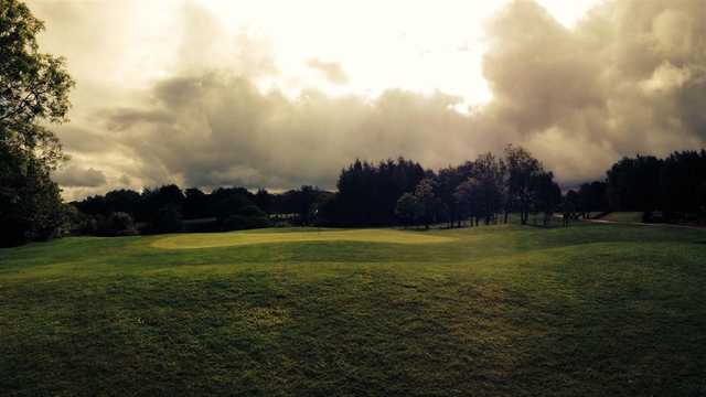 A view of a green at Ashton under Lyne Golf Club.