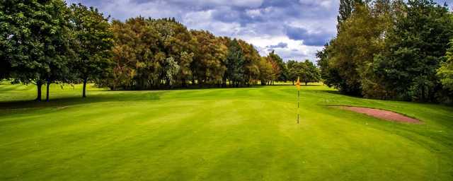 A sunny day view of a green at Didsbury Golf Club.