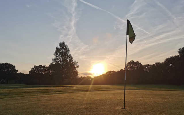 A sunset view of a hole at East Horton Golf Club.