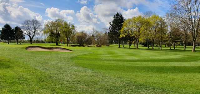 A spring day view of a hole at Aldenham Golf Club.