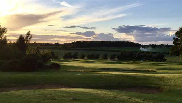 A sunset view of a green at Swaffham Golf Club.