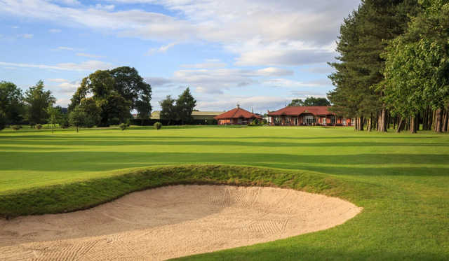 A sunny day view of a fairway at Malton & Norton Golf Club.