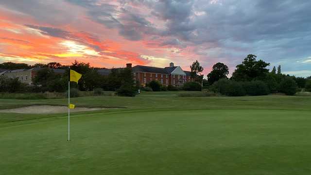 A sunset view of a hole at Whittlebury Park Golf & Country Club.