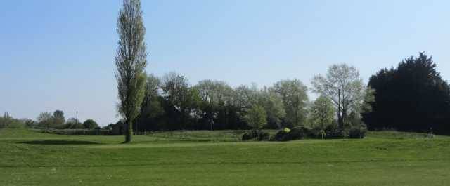 A sunny day view of a hole at Southwell Golf Club.