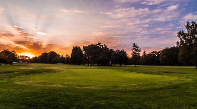 A sunset view of a hole at Bristol & Clifton Golf Club.