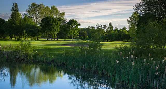 A view over the water of a hole at Academy Course from The Branston Golf & Country Club.