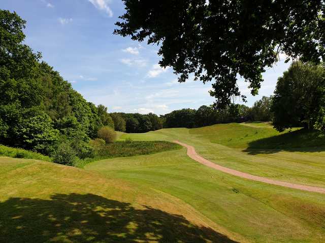 A sunny day view of a tee at The Staffordshire Golf Club.