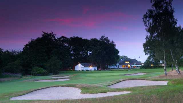 An evening view of the clubhouse and a green at Uttoxeter Golf Club.