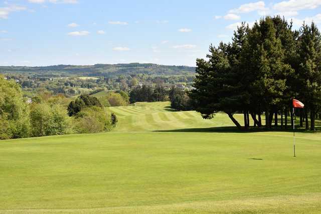 A sunny day view of a hole at Westwood Golf Club.