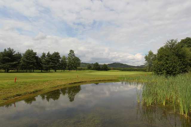 A view over the water of a hole at Bletchingley Golf Club.