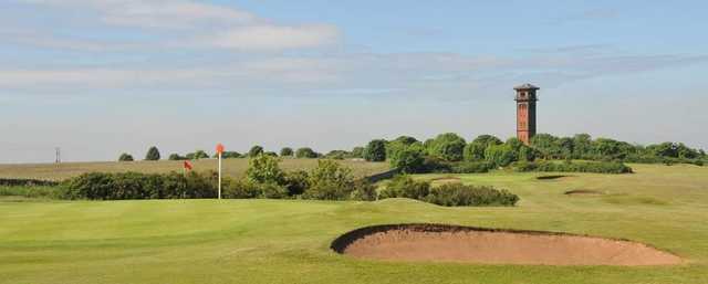 A sunny day view of a hole at South Shields Golf Club.