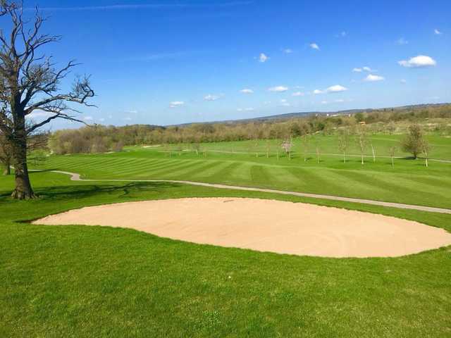 A spring day view of a fairway at West Midlands Golf Club.
