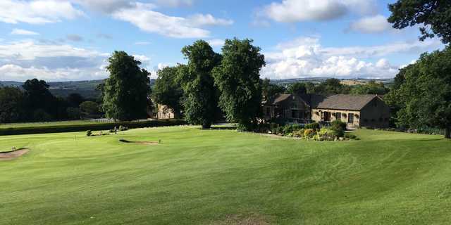 A view of the clubhouse and a green at Bingley St. Ives Golf Club.